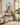Arms of Mercy Christian wall art by Gabriel Heaton in a natural wood float frame above a walnut console with warm neutral styling
