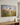 The Handiwork of God gold float framed canvas in a warm neutral interior