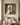 He Is Risen Christian wall art by Gabriel Heaton in a natural wood float frame above a chair in a warm neutral interior