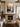 Peace Be Still framed Christian wall art displayed above a stone fireplace in a warm neutral living room